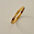 Radiant Emblem Bracelet